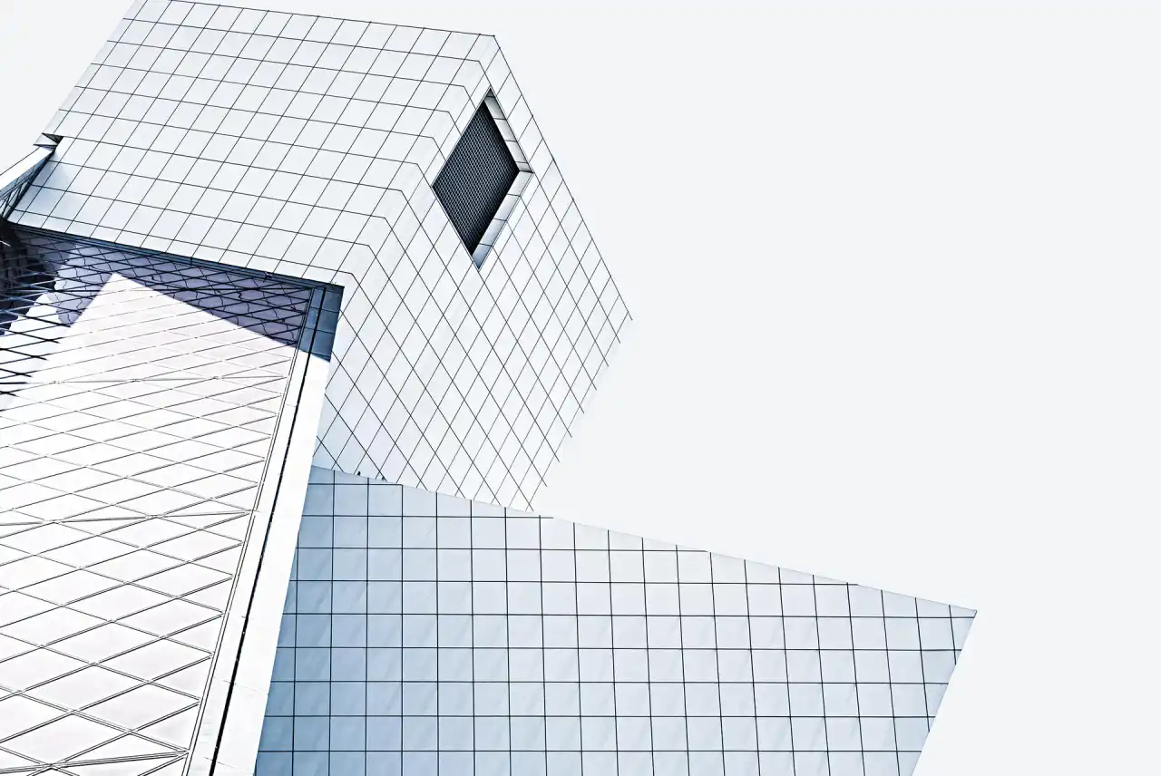 Glass-clad building seen from below
